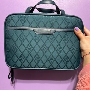 DARK IVY COLOR TRAVEL HAND BAG FROM VICTORIA SECRET.